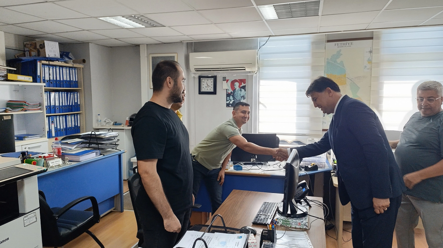 Fethiye Belediye Başkanı Alim Karaca, belediye personeliyle bayramlaştı