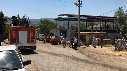 Muhtardan itfaiye tankeri ile yangına ilk müdahale