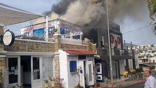 Yardım etmeye gitti, dükkanının yandığını görünce şok yaşadı