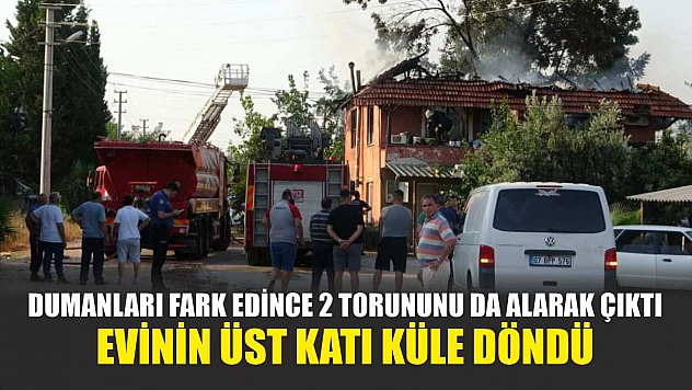Dumanları fark edince 2 torununu da alarak çıktı, evinin üst katı küle döndü