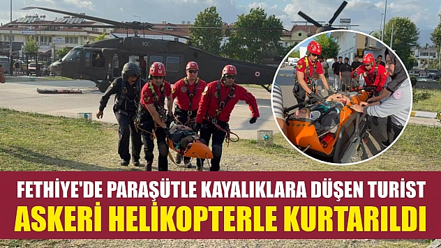 Fethiye'de paraşütle kayalıklara düşen turist askeri helikopterle kurtarıldı