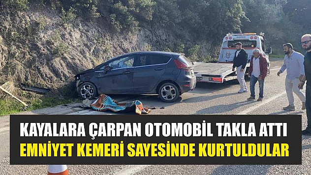Kayalara çarpan otomobil takla attı, emniyet kemeri sayesinde kurtuldular