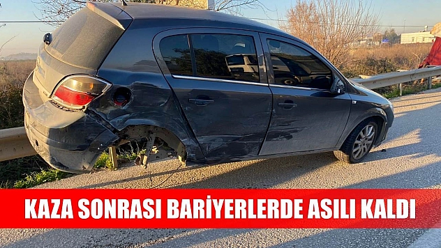 Kaza sonrası bariyerlerde asılı kaldı