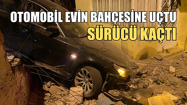 Otomobil evin bahçesine uçtu, sürücü kaçtı