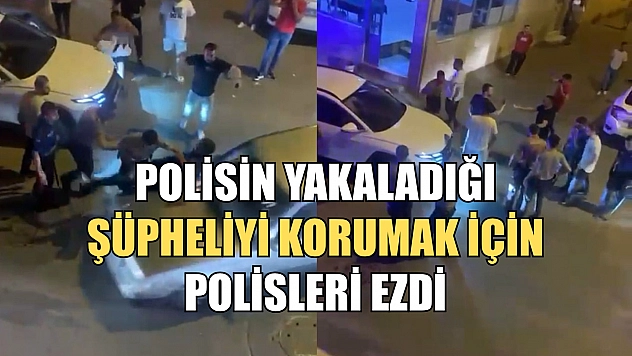Polisin yakaladığı şüpheliyi korumak için polisleri böyle ezdi
