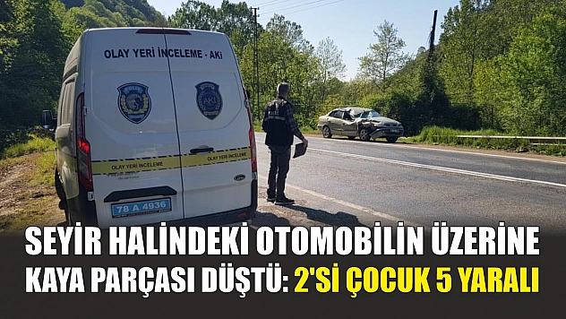 Seyir halindeki otomobilin üzerine kaya parçası düştü: 2'si çocuk 5 yaralı