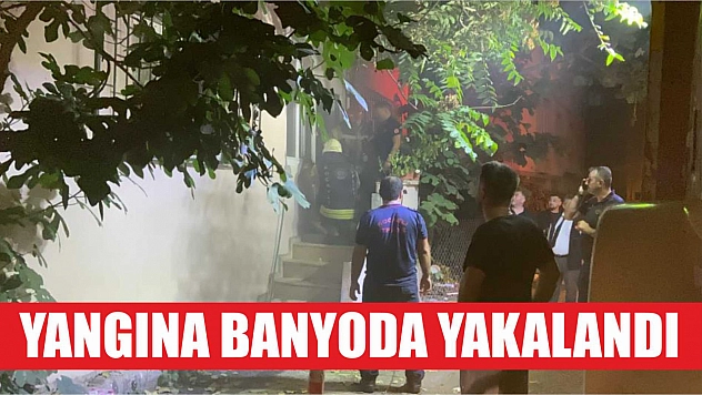 Yangına banyoda yakalandı