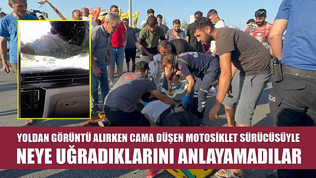 Yoldan görüntü alırken cama düşen motosiklet sürücüsüyle neye uğradıklarını anlayamadılar