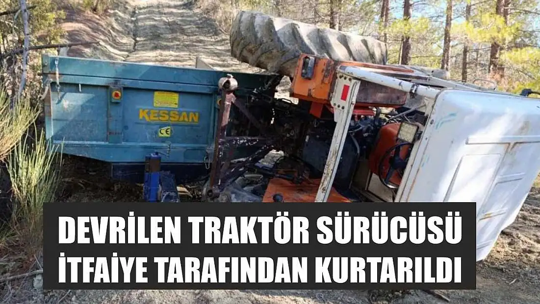 Devrilen traktör sürücüsü itfaiye tarafından kurtarıldı