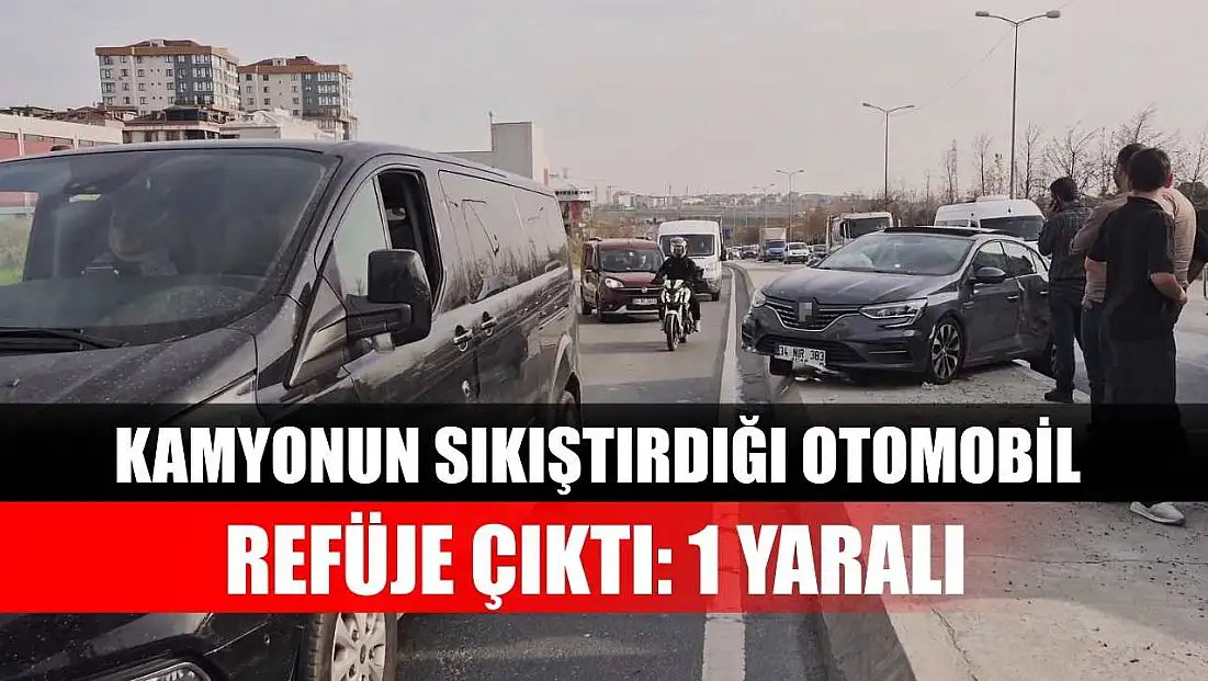 Kamyonun sıkıştırdığı otomobil refüje çıktı: 1 Yaralı