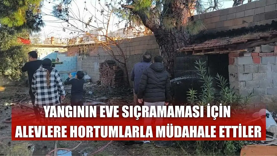 Yangının eve sıçramaması için alevlere hortumlarla müdahale ettiler