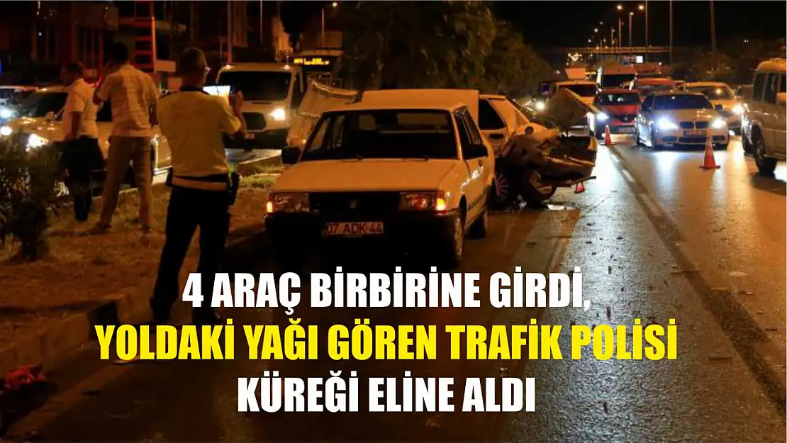 4 araç birbirine girdi, yoldaki yağı gören trafik polisi küreği eline aldı