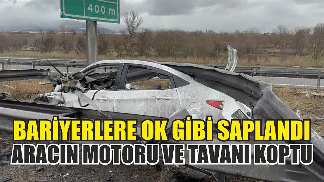 Bariyerlere ok gibi saplanan aracın motoru ve tavanı koptu