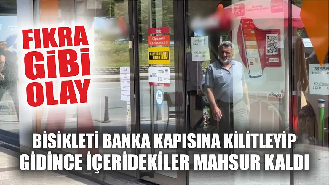 Bisikleti banka kapısına kilitleyip gidince içeridekiler mahsur kaldı