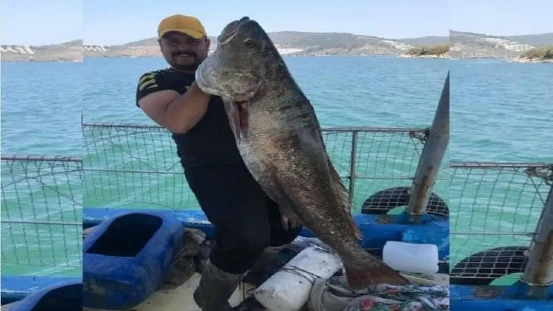 Boyu kadar balıkla böyle poz verdi   