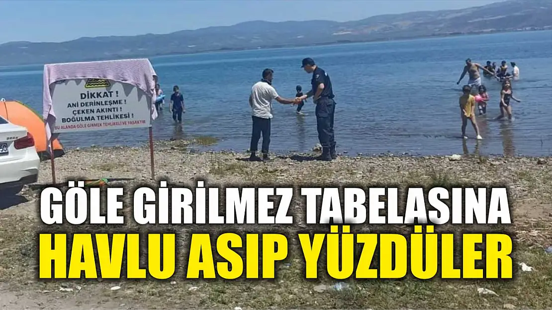 Göle girilmez tabelasına havlu asıp yüzdüler