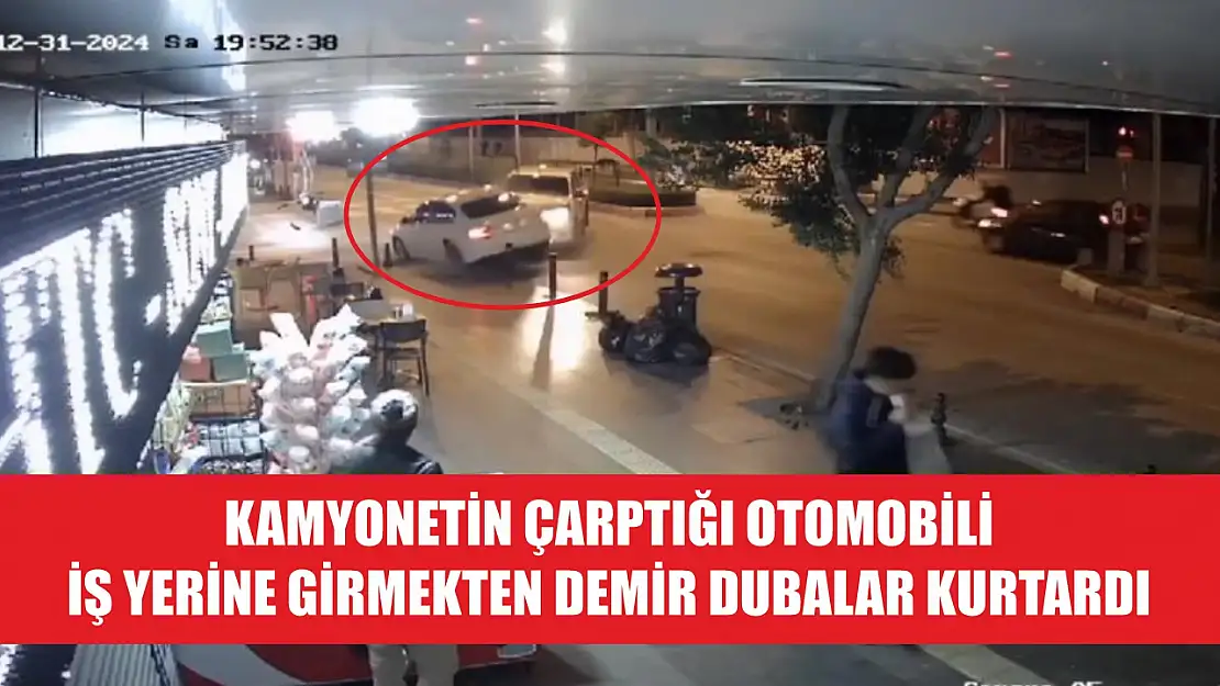 Kamyonetin çarptığı otomobili iş yerine girmekten demir dubalar kurtardı