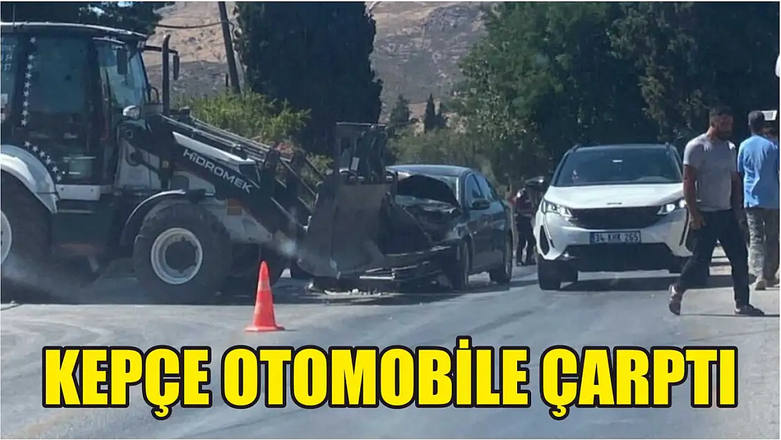 Kepçe otomobile çarptı