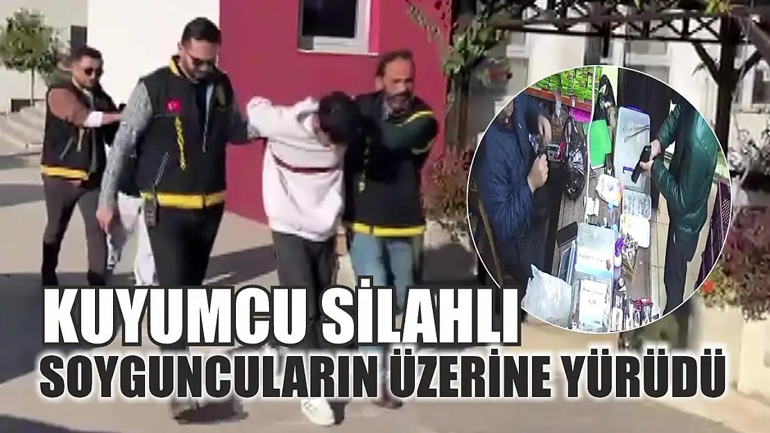 Kuyumcu silahlı soyguncuların üzerine yürüdü