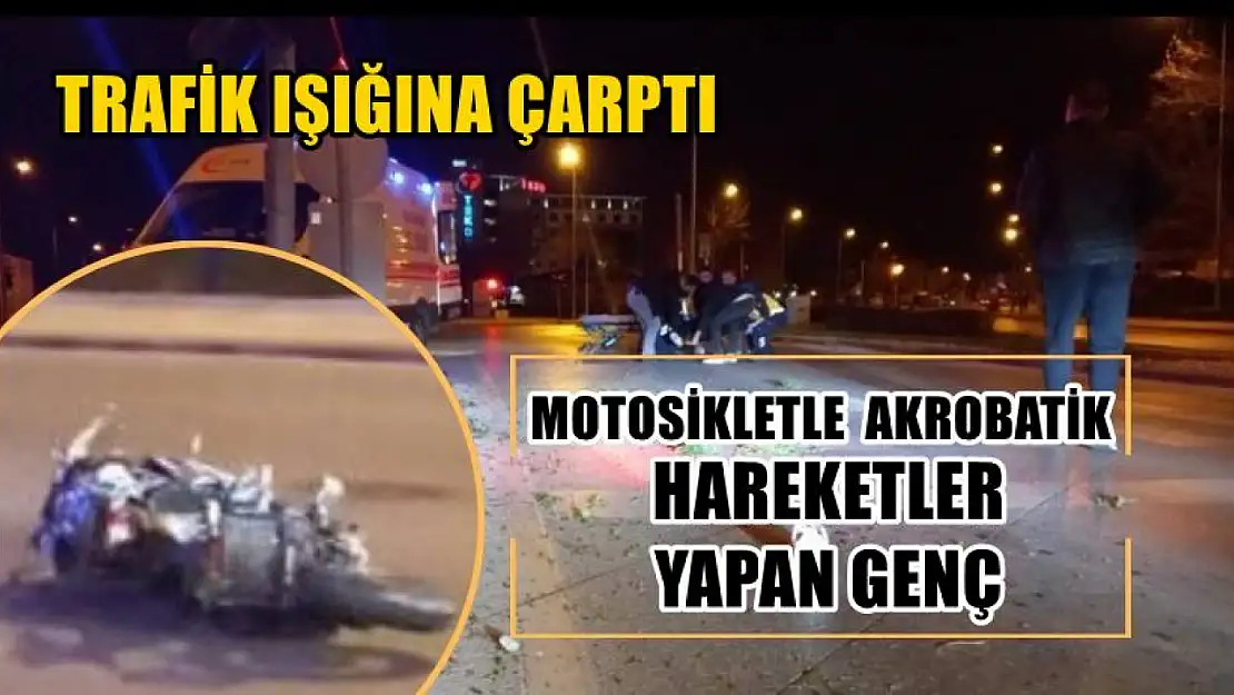 Motosikletle akrobatik hareketler yapan genç, trafik ışığına çarptı