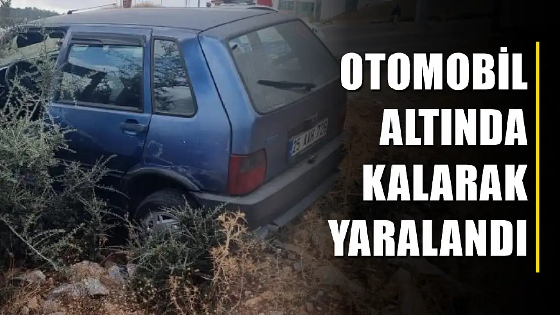 Otomobil altında kalarak yaralandı