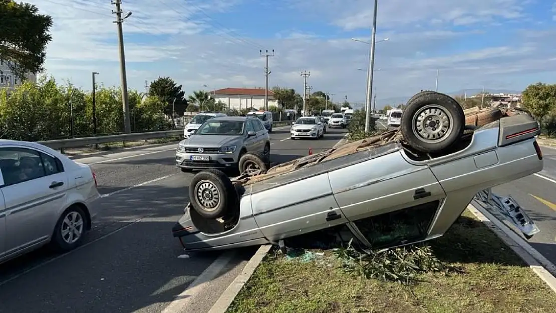 Takla atan otomobildeki iki kişi yaralandı