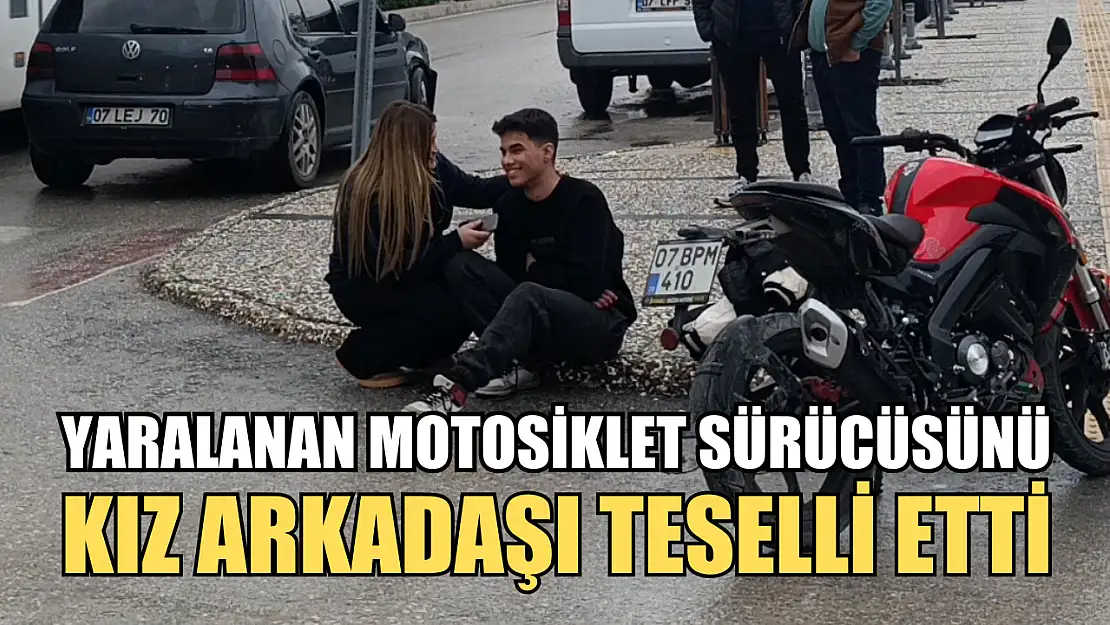 Yaralanan motosiklet sürücüsünü kız arkadaşı teselli etti