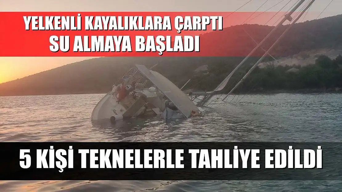 Yelkenli kayalıklara çarptı, su almaya başladı: 5 kişi teknelerle tahliye edildi