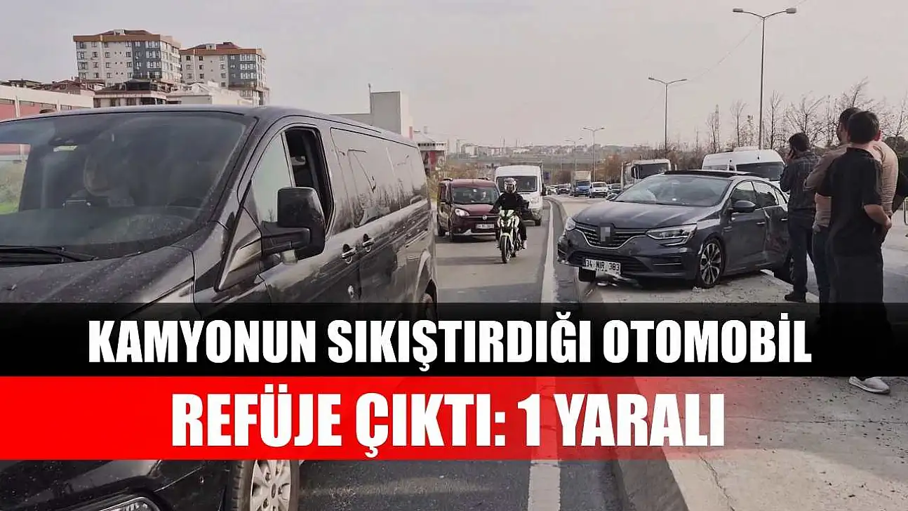 Kamyonun sıkıştırdığı otomobil refüje çıktı: 1 Yaralı