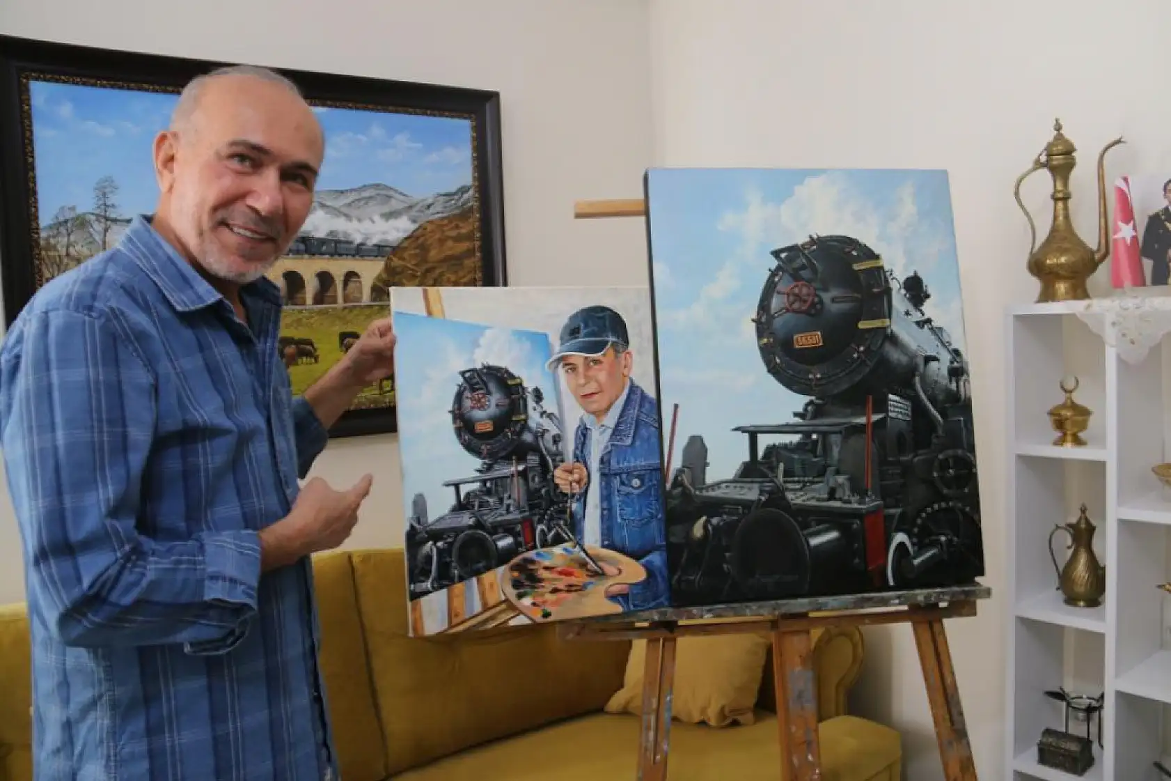 Demir yollarından emekli oldu, hiç bitmeyen tren sevgisini yaptığı tablolarda yaşatıyor
