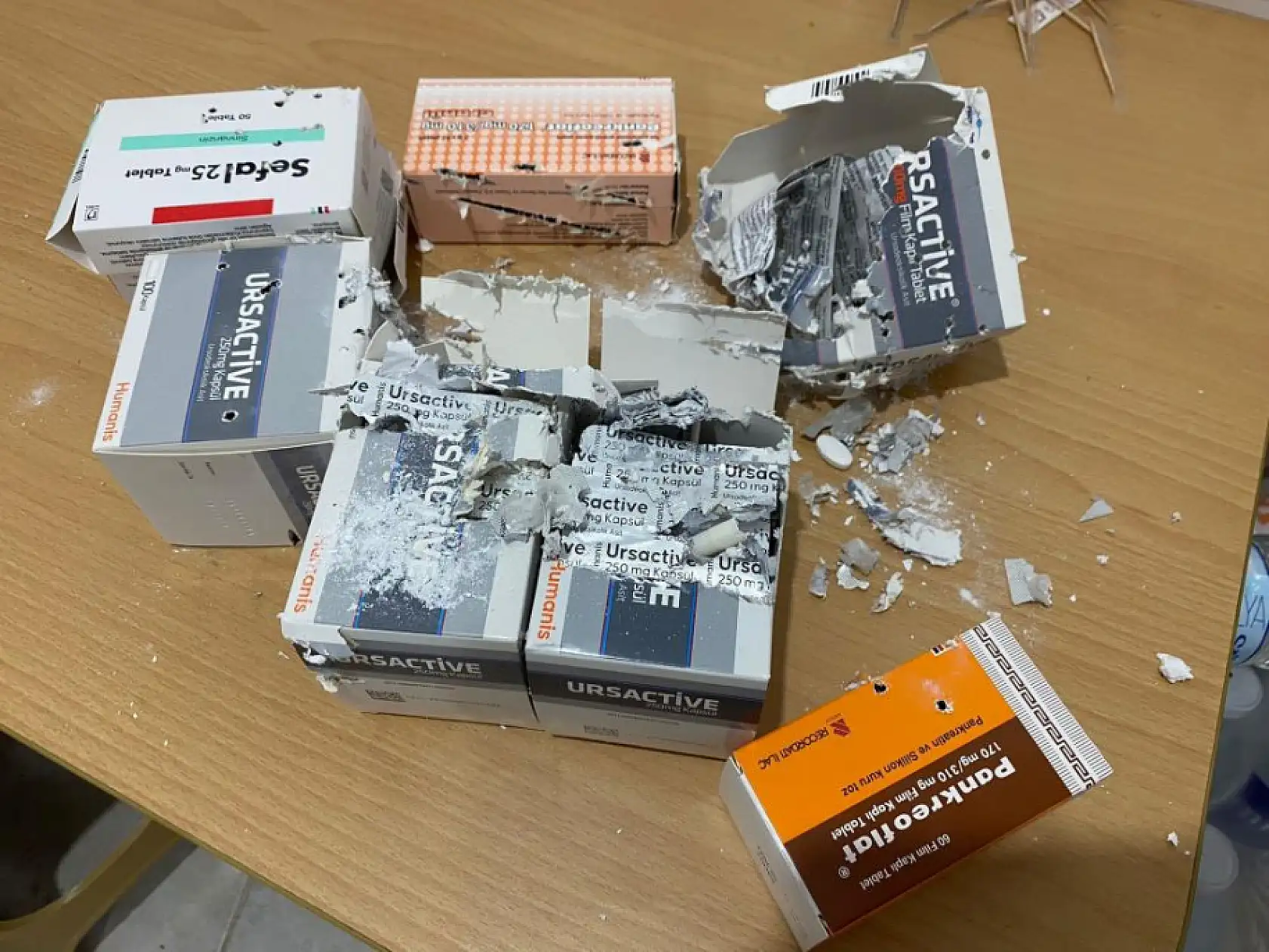 Kızıyla boşanma aşamasındaki damadının eczanesine av tüfeğiyle saldırdı