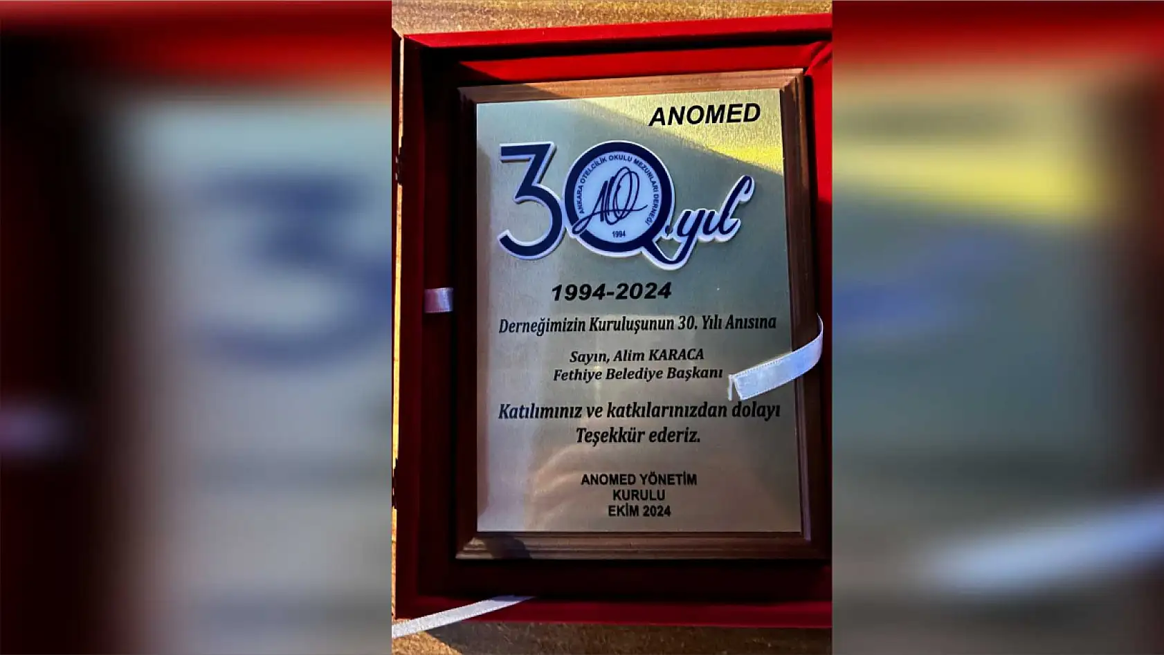 Fethiye Belediye Başkanı Karaca'ya 30. yıla özel anlamlı plaket