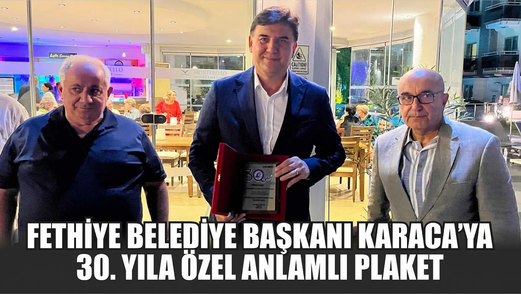 Fethiye Belediye Başkanı Karaca'ya 30. yıla özel anlamlı plaket