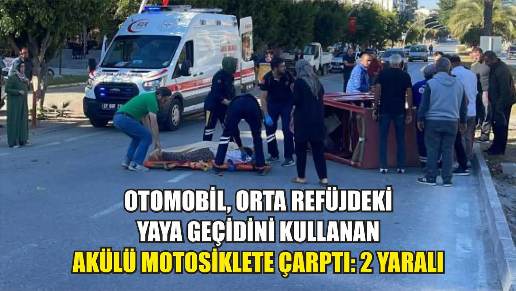 Otomobil, orta refüjdeki yaya geçidini kullanan akülü motosiklete çarptı: 2 yaralı