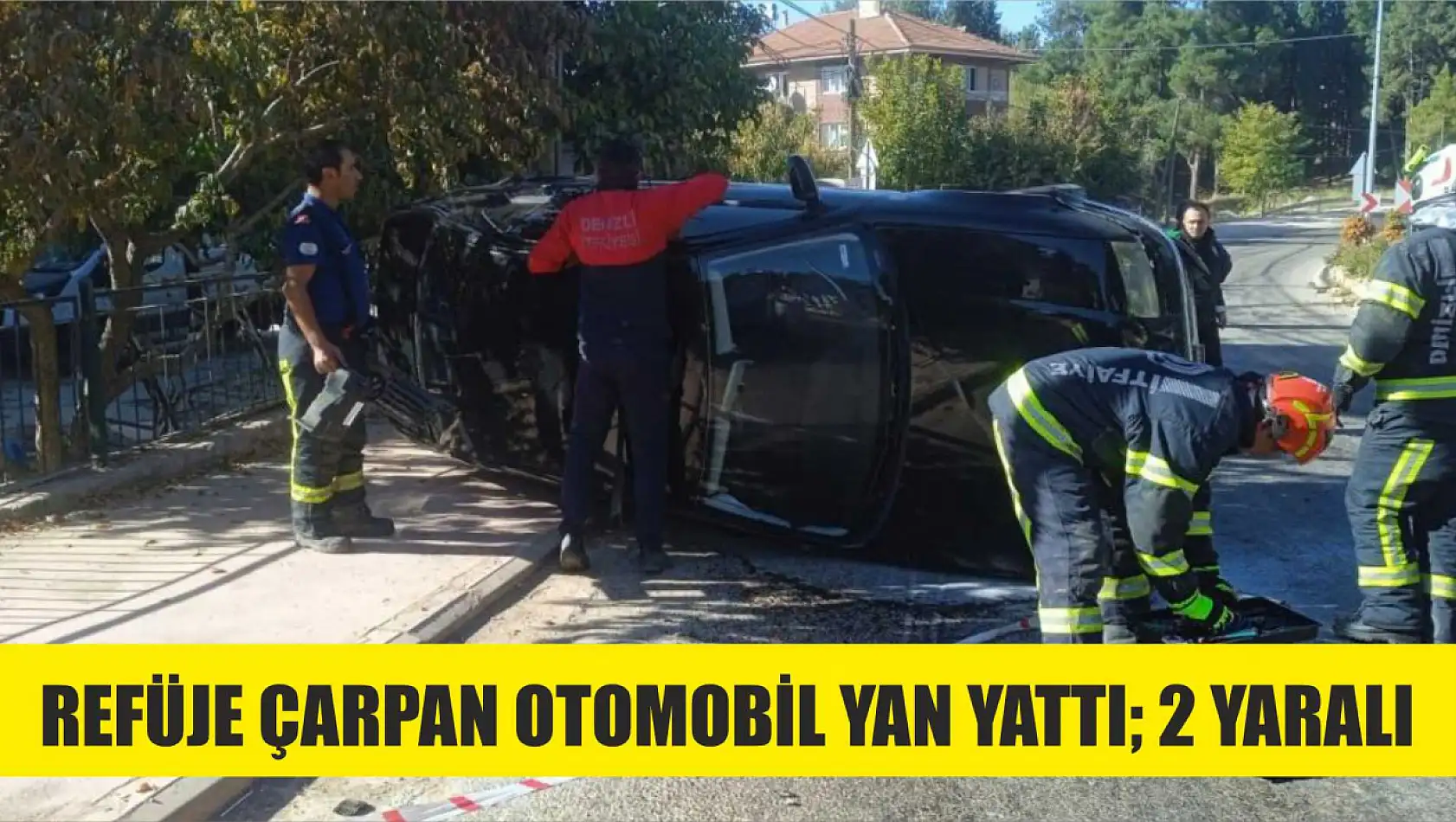 Refüje çarpan otomobil yan yattı 2 yaralı