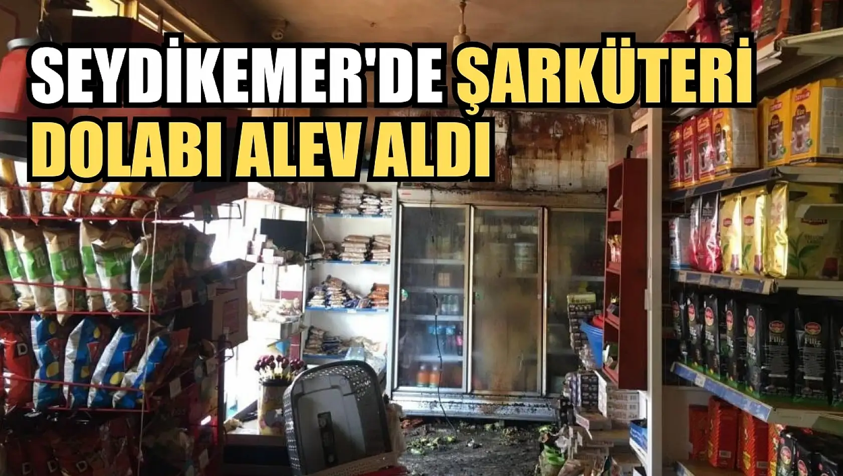 Seydikemer'de şarküteri dolabı alev aldı