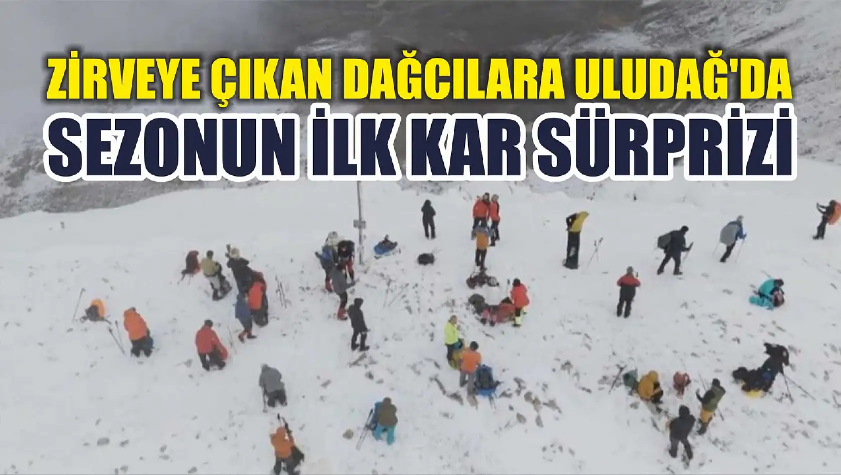 Zirveye çıkan dağcılara Uludağ'da sezonun ilk kar sürprizi