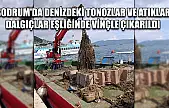 Bodrum'da denizdeki tonozlar ve atıklar dalgıçlar eşliğinde vinçle çıkarıldı