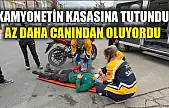 Kamyonetin kasasına tutundu, az daha canından oluyordu