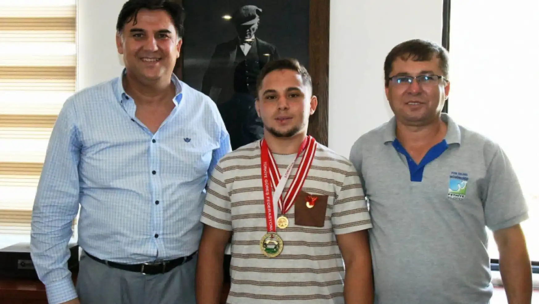 Fethiyeli Şampiyon Güreşçiden Başkan Karaca'ya Ziyaret