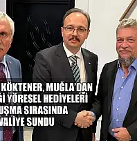 BİK Üyesi Köktener, Muğla'dan getirdiği yöresel hediyeleri buluşma sırasında valiye sundu