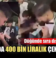 Düğünde sıra dışı hediye: Damada 400 bin liralık çek taktı