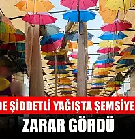 Fethiye'de şiddetli yağışta şemsiyeli sokak zarar gördü