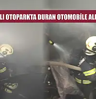 Kapalı otoparkta duran otomobile alevler sarsı