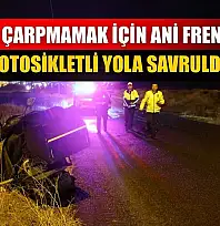Kediye çarpmamak için ani fren yapan motosikletli yola savruldu