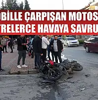 Otomobille çarpışan motosikletli, metrelerce havaya savruldu