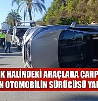 Park halindeki araçlara çarpıp yan yatan otomobilin sürücüsü yaralandı