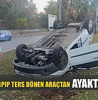 Refüje çarpıp ters dönen araçtan ayakta çıktı