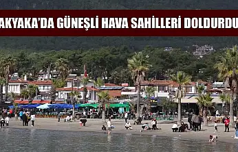 Akyaka'da güneşli hava sahilleri doldurdu