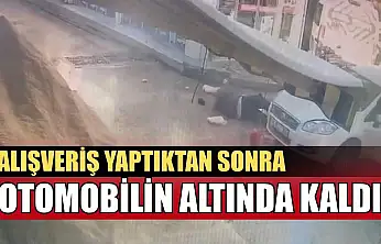 Alışveriş yaptıktan sonra otomobilin altında kaldı